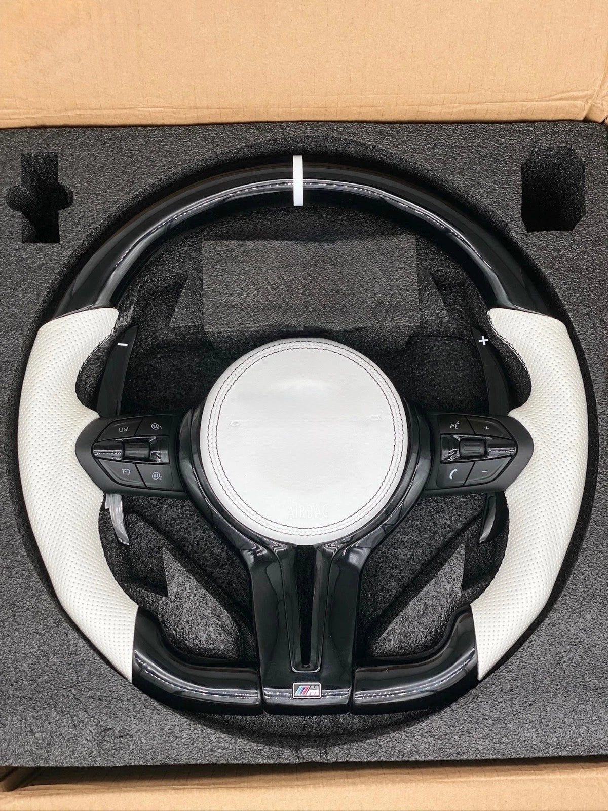 BMW F Series flat-bottom steering wheel - white leather, front view